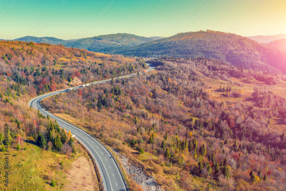 Winding highway in the autumn mountains. Drone view. Beautiful natural landscape. The Carpathians. Ukraine