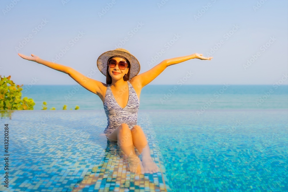 Portrait beautiful young asian woman relax smile enjoy leisure around swimming pool Portrait beautiful young asian woman relax smile enjoy leisure around swimming pool