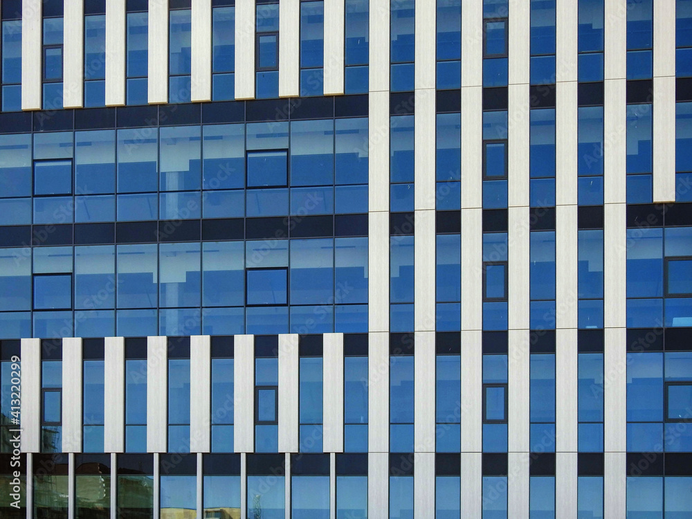 Glass and steel facade wall of a modern office building Glass and steel facade wall of a modern office building