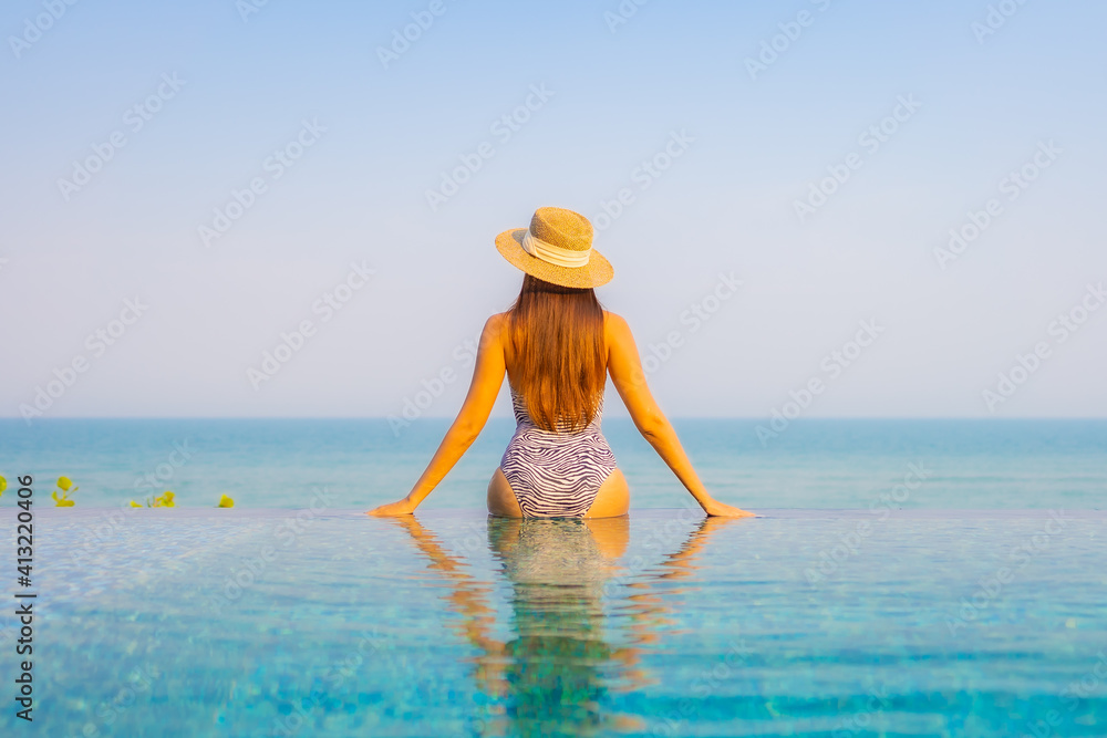 Portrait beautiful young asian woman relax smile enjoy leisure around swimming pool Portrait beautiful young asian woman relax smile enjoy leisure around swimming pool