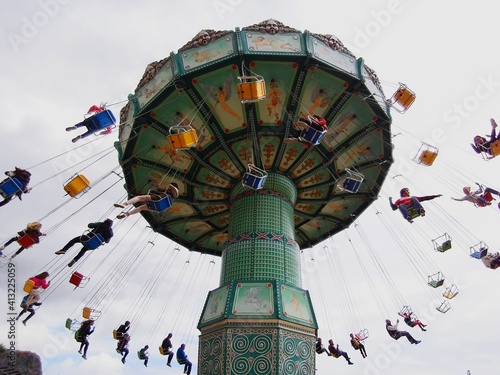 Low Angle View Of Amusement Park Ride Against Sky
