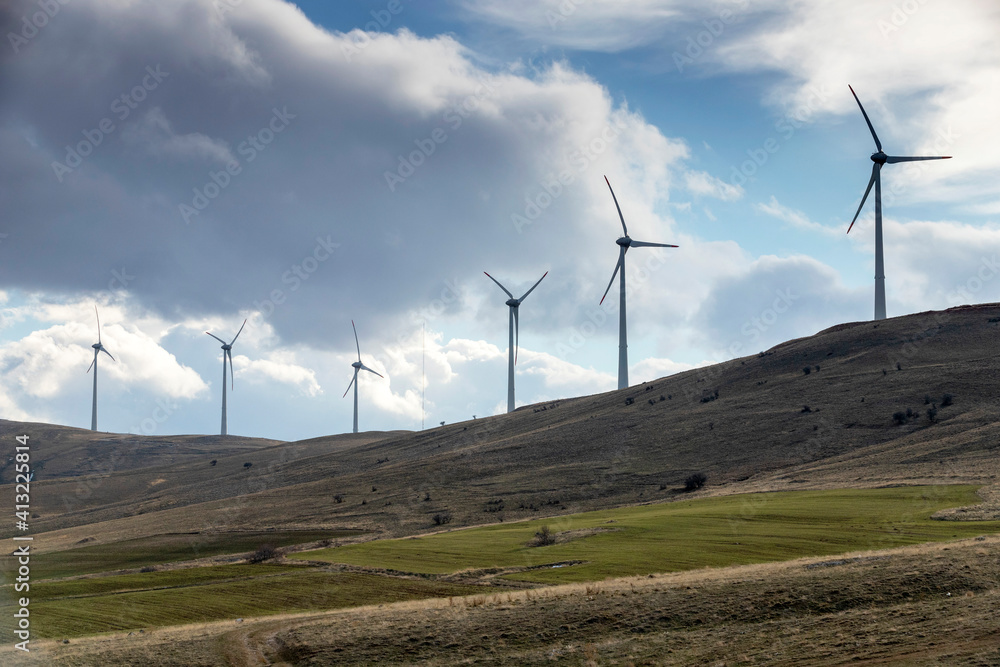 Wind turbines energy farm, green ecological power energy generation. Wind turbines energy farm, green ecological power energy generation.