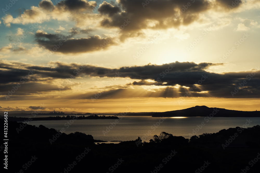 Auckland in the sunset seen from Waiheke Island, New Zealand