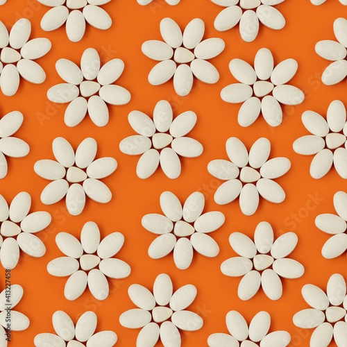 pills seamless pattern on orange background  white vitamins folded in the form of a flower  pattern for printing