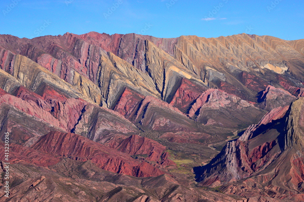 Argentina, Qebrada de Hornocal, famous for the richness of its minerals and its nuances ... A riot of color,.The mountains reach an altitude of 4,761 meters above sea level.World Heritage Site in 2003 - obrazy, fototapety, plakaty 