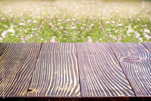 Wooden deck table over beautiful bokeh background