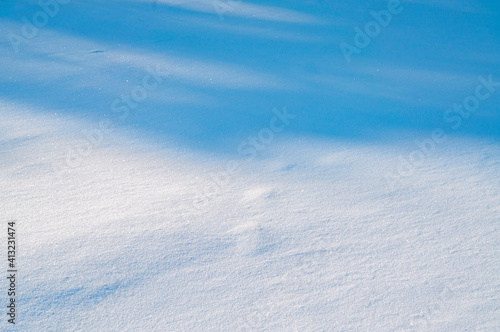 Snow texture with shadow close up