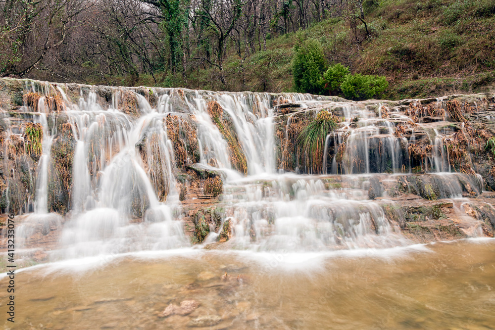 wild waterfall in vizcaya in spain in the town of delika in the river nervion