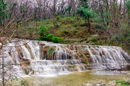 wild waterfall in vizcaya in spain in the town of delika in the river nervion