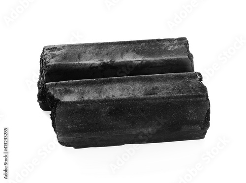 Pile black coal isolated on white background photo