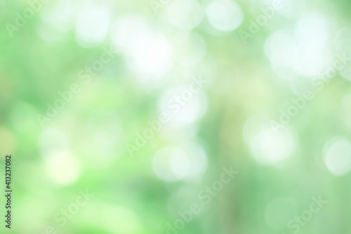 Abstract blur green color for background,blurred and defocused effect spring concept for design background abstract green bubble outdoor focus texture.