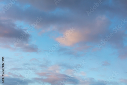 Rain clouds in the sky at sunset