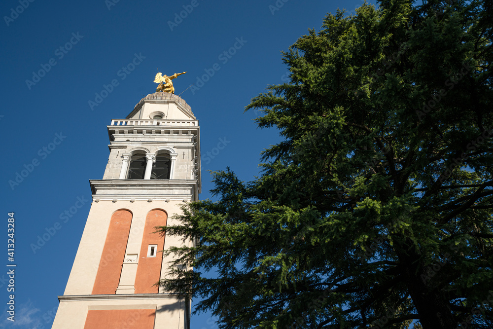 The castle bell tower with the golden angel on the top