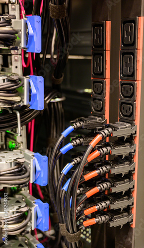Obraz na płótnie Socket strips PDU for server power connection in the server rack w salonie