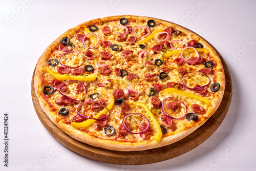 pizza with olives, sausage, onion, pepper
