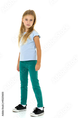 Cute little girl in t-shirt and jeans