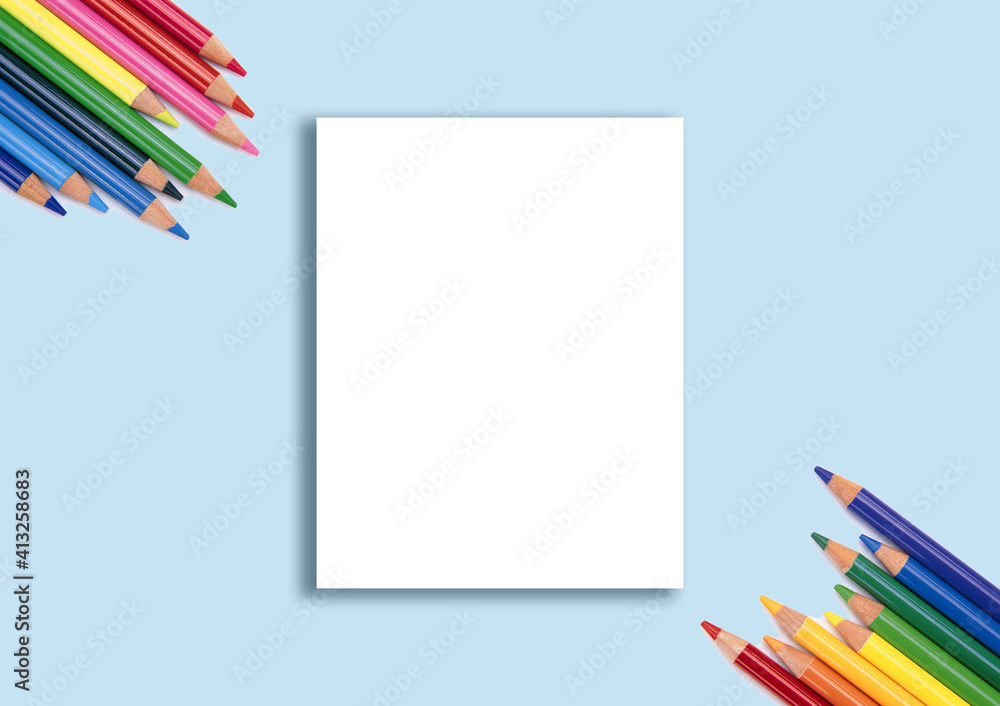 Fototapeta premium Rectangular layout of the invitation card with colored pencils.