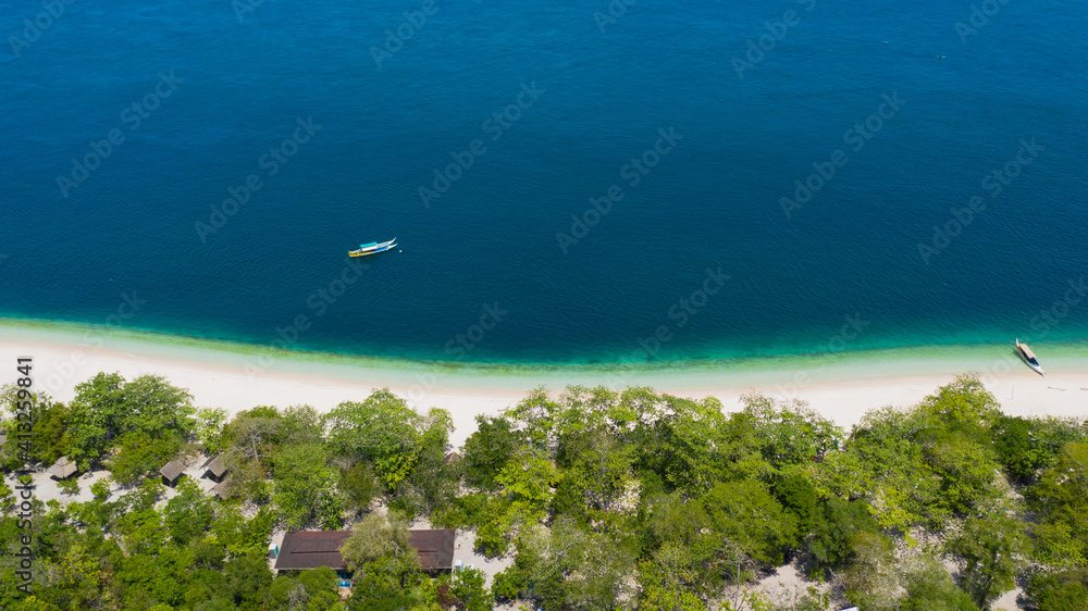 Fototapeta premium Aerial view of Seascape with beautiful beach and tropical Great Santa Cruz island. Zamboanga, Mindanao, Philippines.