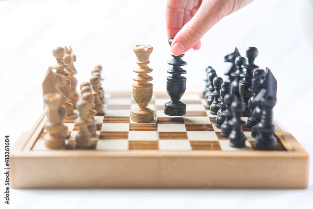 Businesswoman thinking how to play chess concept business strategy for win