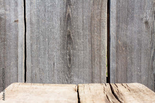 Old wooden wall and empy wooden planks backdrop background. Mock up template for display and showing product photo