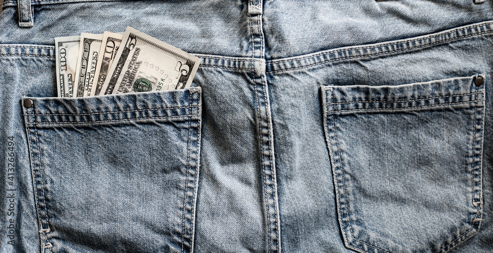 us dollars cash in jeans pocket
us dollars cash in jeans pocket