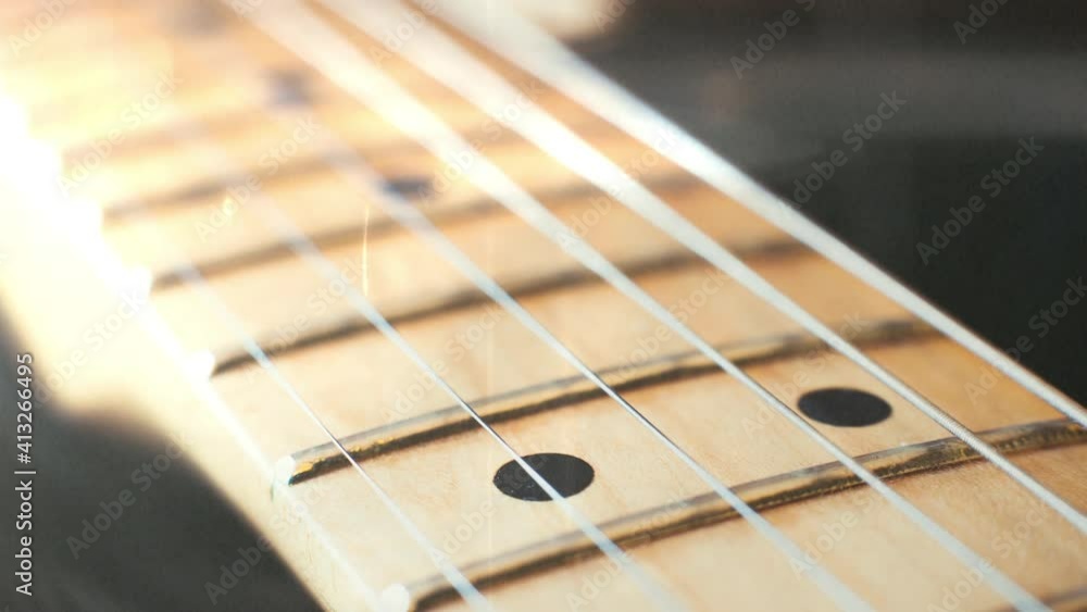 Guitar background stringed instrument electric guitar fretboard and chords detail selective focus panning Guitar background stringed instrument electric guitar fretboard and chords detail selective focus panning