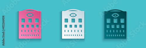 Paper cut Eye test chart icon isolated on blue background. Poster for vision testing in ophthalmic study. Snellen chart. Paper art style. Vector.