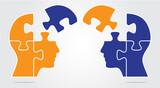 Two heads with puzzle pieces in move for business concept projects and brainstorming