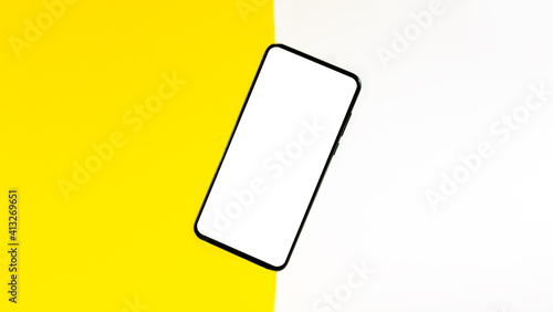 Mock up of a smartphone on different colored backgrounds.