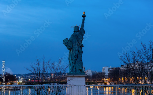 Famous Statue de la Liberte (By Auguste Bartholdi 1834-1904) at dawn - Paris, France. This statue was given in 1889 to France by U.S. citizens living in Paris.