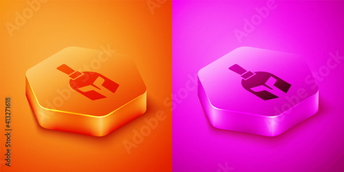 Isometric Greek helmet icon isolated on orange and pink background. Antiques helmet for head protection soldiers with a crest of feathers or horsehair. Hexagon button. Vector.