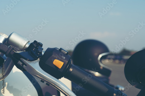 Helmet on the motorcycle biker close up