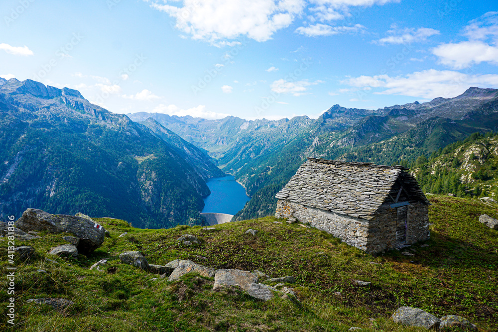 Perfect view from the Corte di Mezzo alp to the Lago del Sambuco dam Perfect view from the Corte di Mezzo alp to the Lago del Sambuco dam
