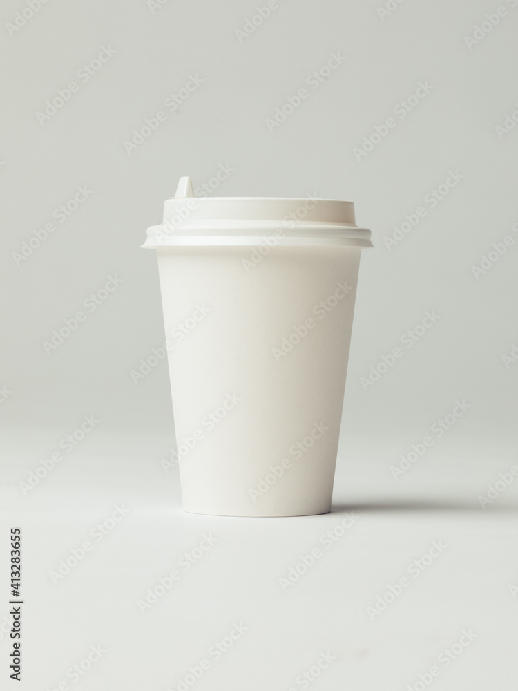 Coffee cup set - mockup template for cafes, design of the restaurant's corporate style. White cardboard coffee cup mockup. Template disposable plastic and paperware for hot drinks Coffee cup set - mockup template for cafes, design of the restaurant's corporate style. White cardboard coffee cup mockup. Template disposable plastic and paperware for hot drinks