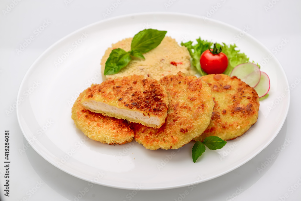 Chicken cutlet in batter with bulgur. Healthy food Chicken cutlet in batter with bulgur. Healthy food