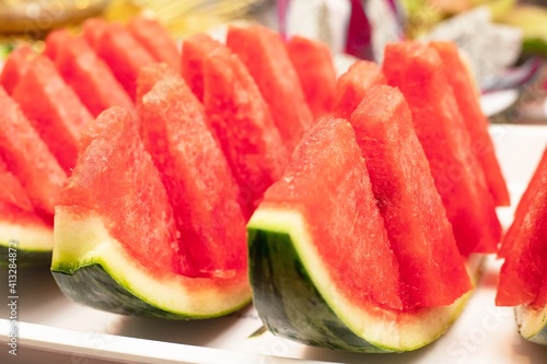 Watermelon slices ready to be served at the party. Healthy natural snack food concept