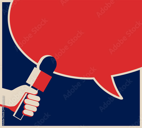 Hand holding microphone with speech bubble