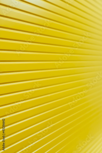 bright sunny yellow background with cross stripes defocusing