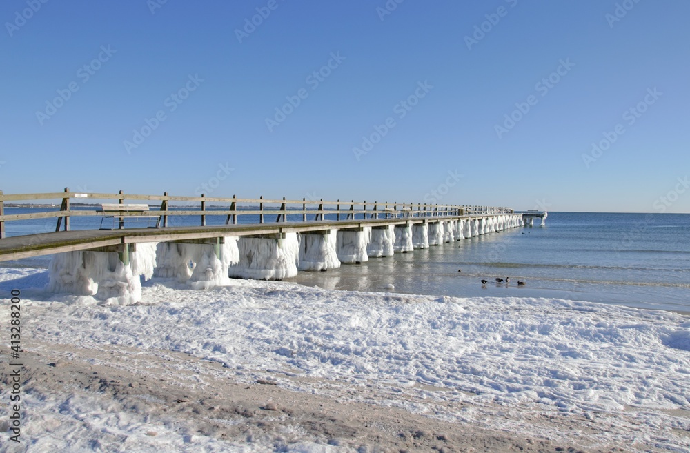 Icy bridge at the sea