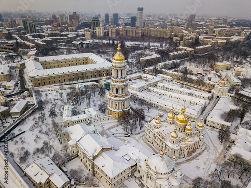 Kiev Pechersk Lavra, covered with snow. Cloudy winter morning. Aerial drone view.