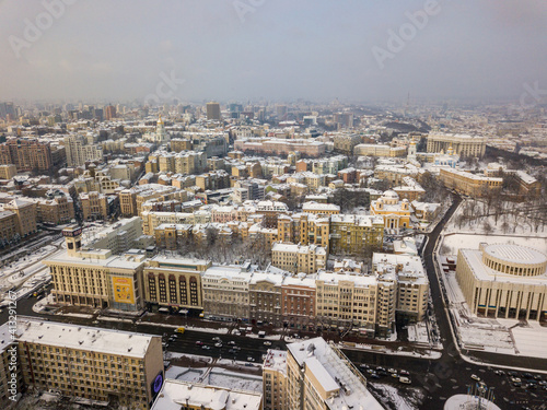 Wallpaper Mural Kiev covered with snow. Aerial drone view. Frosty winter cloudy morning. Torontodigital.ca