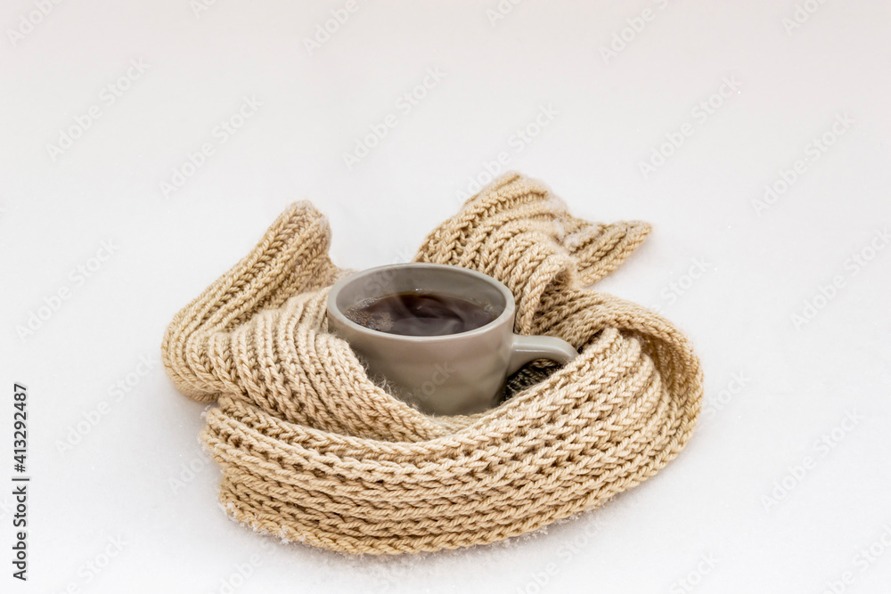 Thinking of you - card. Mug of tea with steam in a knitted scarf. 