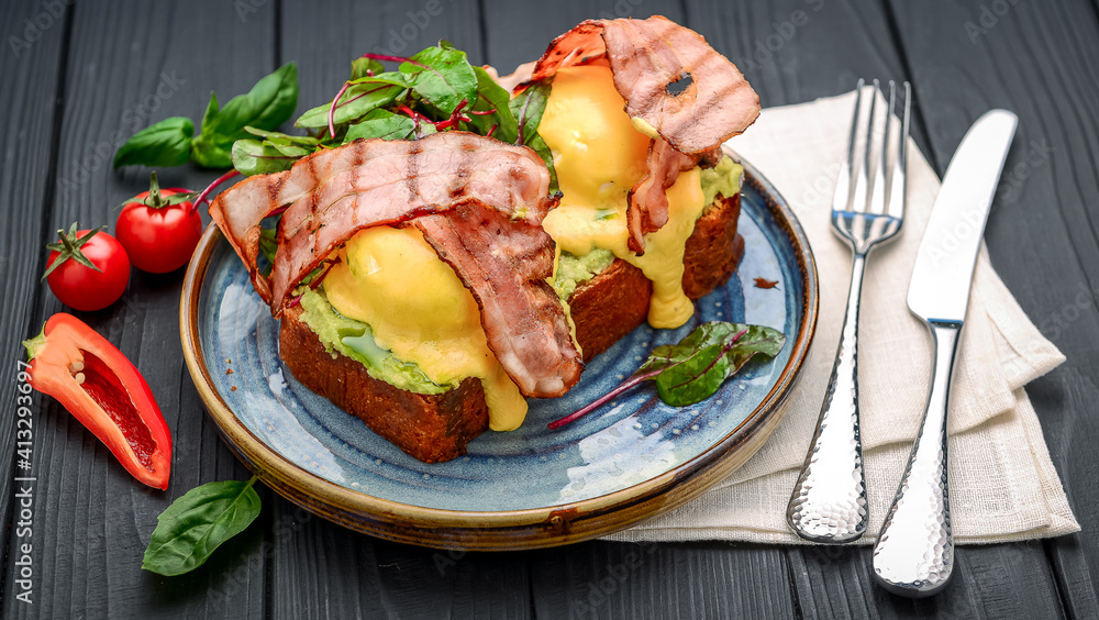 Eggs Benedict- toasted , bacon, poached eggs, and delicious buttery hollandaise sauce Eggs Benedict- toasted , bacon, poached eggs, and delicious buttery hollandaise sauce