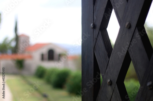 Wooden door, entrance to beautiful Mediterranean park and building in Split, Croatia. Selective focus. photo
