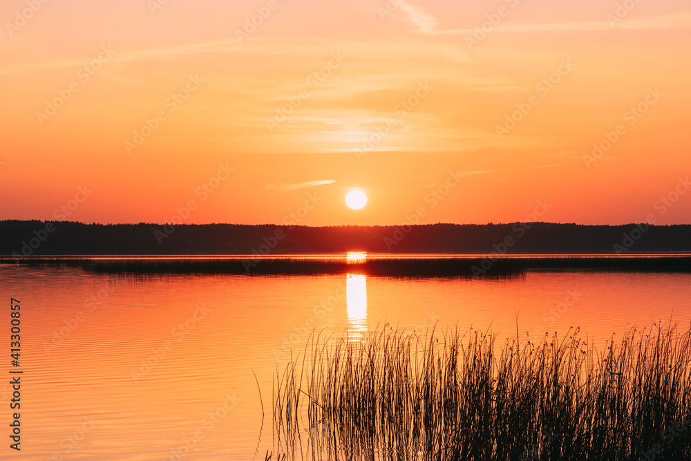 Sundown Above Lake River Horizon At Sunset. Natural Sky In Warm Colors Water. Sun Waters