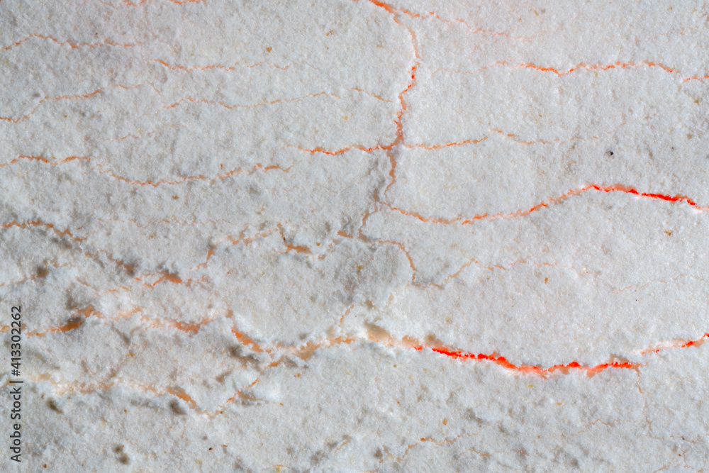 Obraz premium abstraction fire through the snow, cracks in the snow, flour