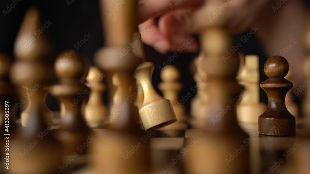 White and black pieces on chess board. Chess board set during the game White and black pieces on chess board. Chess board set during the game
