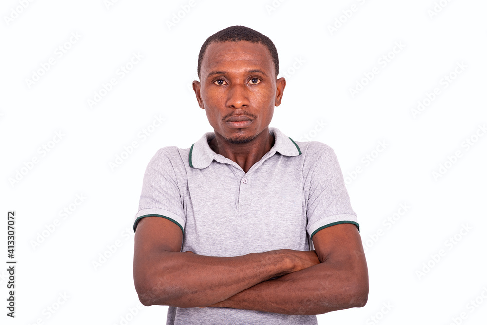 serious adult man crossing his arms. serious adult man crossing his arms.