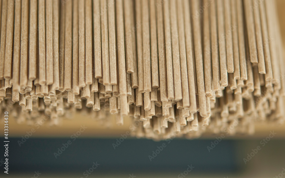 soba - buckwheat noodles (raw buckwheat noodles). soba noodles. food background soba - buckwheat noodles (raw buckwheat noodles). soba noodles. food background
