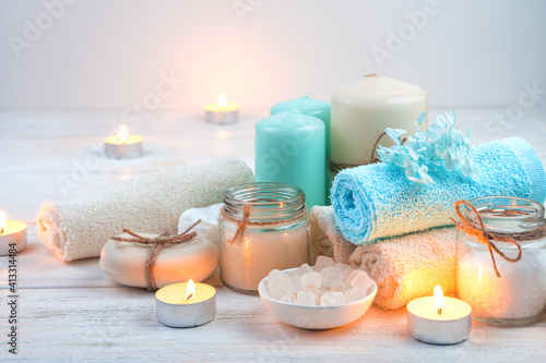 Beautiful spa set with candles on a light background. The concept of relaxation  recovery.